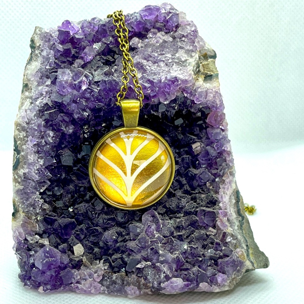 Gold and bronze glass color pendant